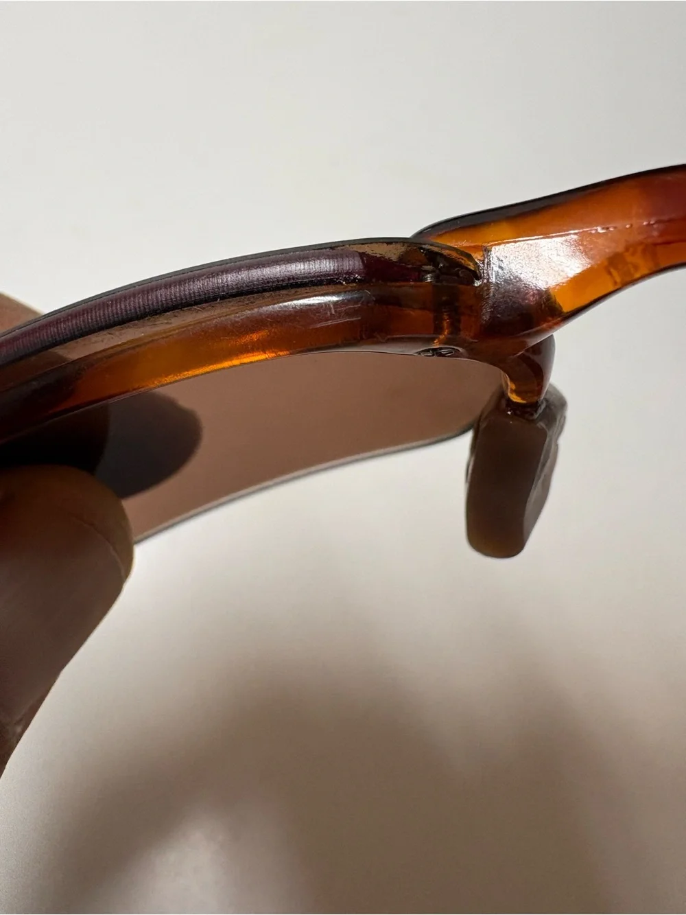 Please see the pictures one of the lenses little small piece missing,